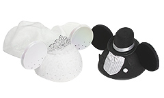Newlywed mouse ears - white with a train for the bride and a tux for the groom.