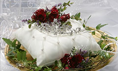 Quinceanera pillow with red flowers and tiara